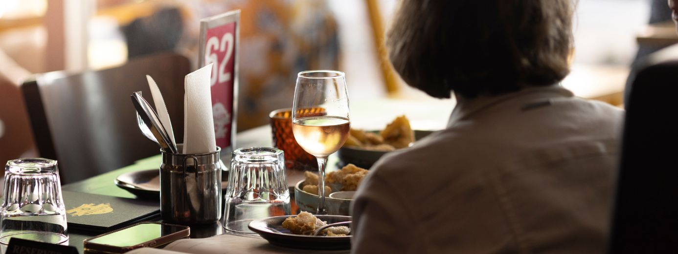 A person sitting at a table at Citizen Q